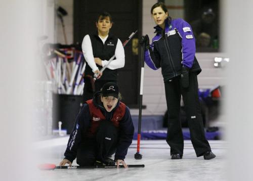 John Woods / Winnipeg Free Press / December 12, 2006 - 061212  - Calleen Neufeld (f) curls at the Asham Curling Club Sunday Dec 12/06.
