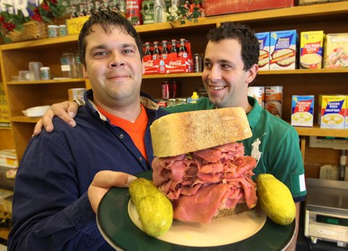 Tyler Steek, left, and his brother Harrison at Myers Deli on Grant Ave with the Hustler and Lawless sandwich which is packed with 350 grams of meat See Detour story  Sept 13, 2011-(JOE BRYKSA / WINNIPEG FREE PRESS)