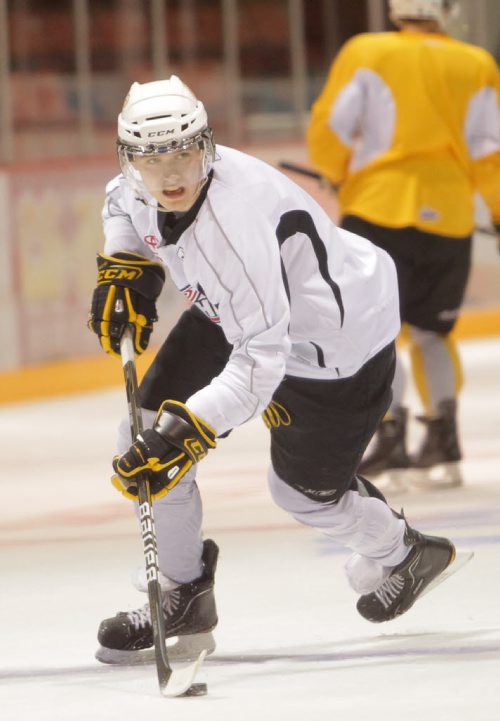Brandon Sun 15092011 Carter Proft #12 of the Brandon Wheat Kings takes part in a drill during practice at Westman Place on Thursday. (Tim Smith/Brandon Sun)