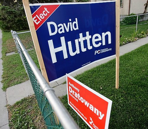 Political signs in Elmwood on Hespeler Avenue for Progressive Conservative, David Hutten, and Liberal, Anthony Dratowany, September 25th, 2011. (TREVOR HAGAN/WINNIPEG FREE PRESS)