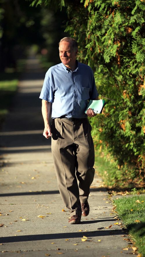 Dr Jon Gerrard walks the beat in River Heights on the campaign trail Tuesday. See story. Sept 27, 2011 (Phil Hossack - Winnipeg Free Press)