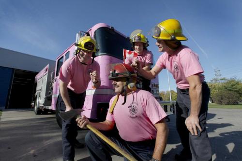 Fire Fighters from Station 8 at 640 Kimberly Ave. are inviting cancer survivors and their friends and family to come and sign "Pinky" the pink fire engine in support of the fight against all cancers, especially breast cancer all day Saturday at their Station and on Sunday at Station 1 located at 65 Ellen Street.   Names from left - Jay Shaw, Barry Savage, Ian McKenta and Captain Bob Ezinicki (centre with axe). Oct 1, 2011 Ruth Bonneville  Winnipeg Free Press