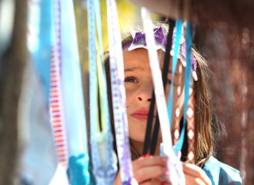 Eight year old Sydney Puge examines hand made necklaces by "Tawny Bee" Saturday morning at the Cultural Days Market at Old Market Square Saturday. See Cultural Days story. Oct 1, 2011 Ruth Bonneville  Winnipeg Free Press