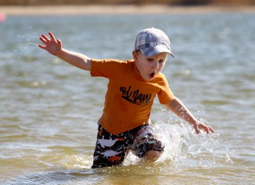 Three year old Owen Eisbrebber dives into the refreshing cool water i at Birds Hill Park Wednesday as the unseasonal warm fall weather continues.   See story by Melissa Martin  Oct 05, 2011 Ruth Bonneville  Winnipeg Free Press