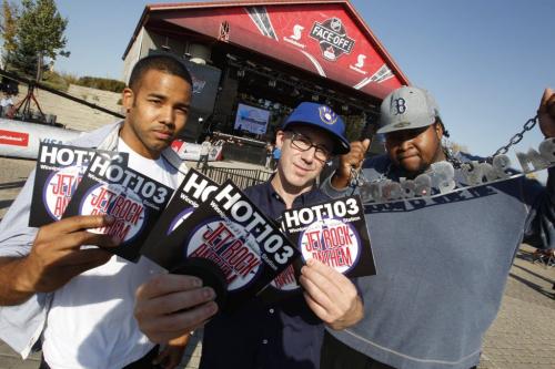 Saint Kris and Bubba B pose for a photo with Ace Burpee, centre,  at the Forks with some CDs they made.  Oct. 6, 2011 (BORIS MINKEVICH / WINNIPEG FREE PRESS)