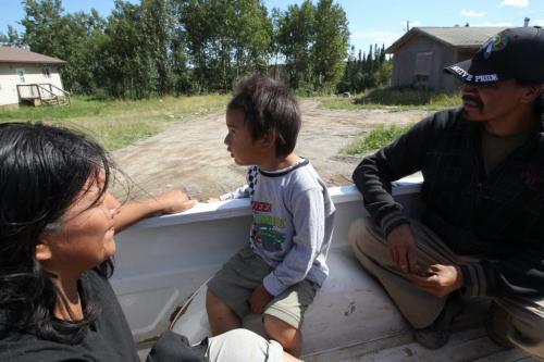 Geordie Rae Jr. with his son Lucas, 3 years and wife Rose go for a pickup ride in  St. Theresa Point First Nation. Their family home is being renovating with running water- See Mary Agnes No Running Water Feature  August 17, 2011   (JOE BRYKSA / WINNIPEG FREE PRESS)