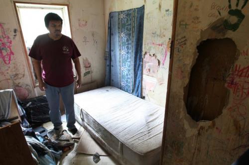 The front doorway in the  trailer of Richard Andrews in Wasagamack First Nation.  It is in filthy condition, has mold and is overpopulated by over 13 people living inside. It has  no running water- See Mary Agnes No Running Water Feature  August 18, 2011   (JOE BRYKSA / WINNIPEG FREE PRESS)