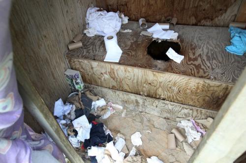 The inside of the outhouse near  Richard Andrews trailer in Wasagamack First Nation.  It is in filthy condition, has mold and is overpopulated by over 13 people living inside. It has  no running water- See Mary Agnes No Running Water Feature  August 18, 2011   (JOE BRYKSA / WINNIPEG FREE PRESS)