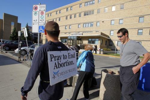 Outside womens hospital on Notre Dame there are anti-abortion demonstrators. They are there daily. Nick Martin is doing a  story on a school wanting to give credit for students wanting to join the march..  Oct. 11, 2011 (BORIS MINKEVICH / WINNIPEG FREE PRESS)