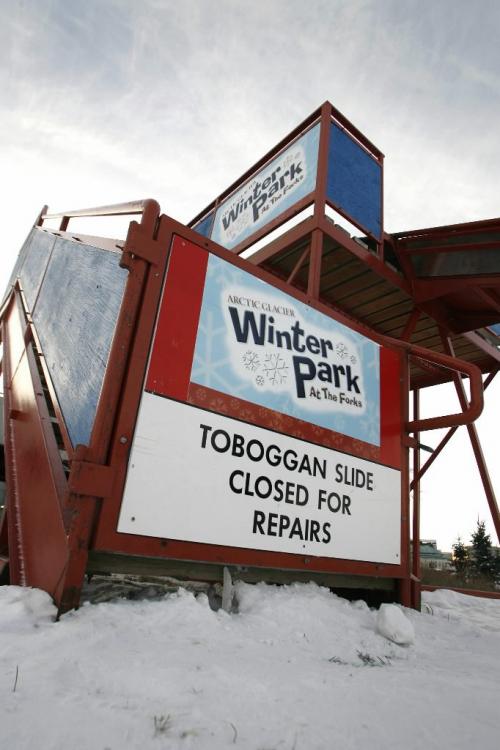 John Woods / Winnipeg Free Press / December 17, 2006 - 061217 - The toboggan slide at The Forks was closed for repairs Sunday Dec 17/06.