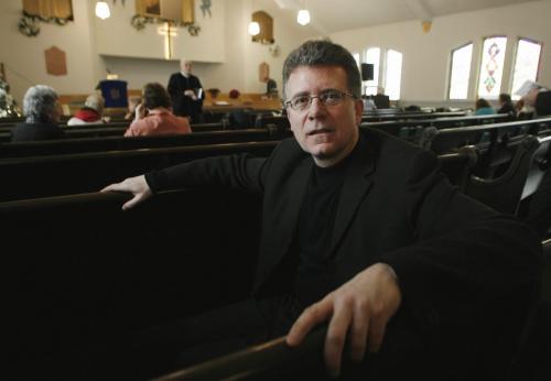 John Woods / Winnipeg Free Press / December 17, 2006 - 061217  - Ian Restall, chair of the church council, sits in a pew of Tabernacle Baptist Church on Bannerman Sunday Dec 17/06.   The church is going through a minor resurgence. Re: Sinclair story