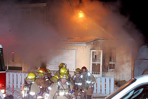 BORIS MINKEVICH / WINNIPEG FREE PRESS  061217 Winnipeg fire fighters work on 828 Bernell where a house burnt down.