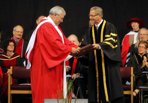 University of Winnipeg convication. Murray Sinclair is given an degree by Bob Silver. He spoke to the students.  Oct. 16, 2011 (BORIS MINKEVICH / WINNIPEG FREE PRESS)