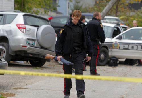 Images from the aftermath of a police chase that ended badly in the back lane of the 100 block of Balmoral. Police had to unload their damaged car(including their shotgun). Ambulance was seen leaving the scene. Please call police to confirm info.   Oct. 17, 2011 (BORIS MINKEVICH / WINNIPEG FREE PRESS)