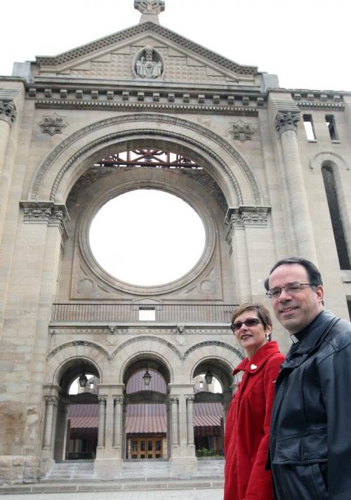 Renovation and repairs at St. Boniface Cathedral (ruins and new church) at cost of $6 million Rev. Marcel Damphousse and Julie Turenne- Maynard, project coordinator outside church- See Brenda Suderman story October 19, 2011   (JOE BRYKSA / WINNIPEG FREE PRESS)