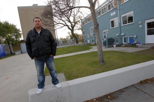 Greg Robson poses for some photos in his old hood, Stella Walk. Follow story to the shooting last year.   Oct. 20, 2011 (BORIS MINKEVICH / WINNIPEG FREE PRESS)