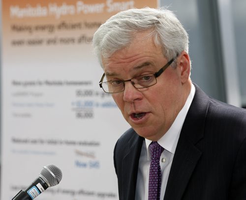 in pic  Premier Greg Selinger ,and (not in pic)  Lloyd Kuczek Vp of Mb Hydro  introduce incentives to make energy-efficent home renovations -  KEN GIGLIOTTI /  WINNIPEG FREE PRESS /  Oct 21 2011
