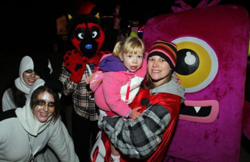 Boo at the Zoo standup photo.  Ginger Dusk Koslowsky with daughter Emmah pose for a photo with some of the charactors waling around the zoo. Oct. 23, 2011 (BORIS MINKEVICH / WINNIPEG FREE PRESS)