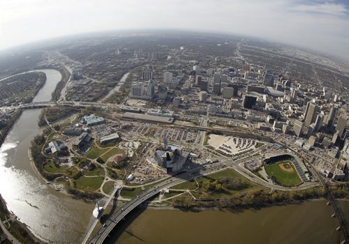Aerial view of The Norwood Bridge, The Forks, The Assiniboine River, The Esplanade Riel and Provencher Bridge over the Red River, The Canadian Museum for Human Rights, Shaw Park, and downtown, October 21st, 2011. (TREVOR HAGAN/WINNIPEG FREE PRESS) CMHR
