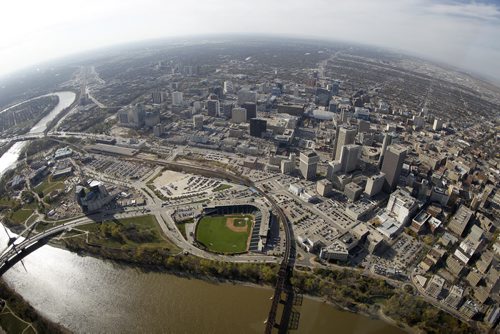Aerial view of The Norwood Bridge, The Forks, The Assiniboine River, The Esplanade Riel and Provencher Bridge over the Red River, The Canadian Museum for Human Rights, Shaw Park, downtown, and Waterfront Drive, October 21st, 2011. (TREVOR HAGAN/WINNIPEG FREE PRESS) CMHR