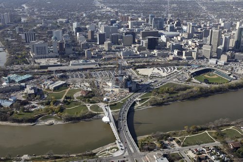 Aerial view of The Forks, The Assiniboine River, The Esplanade Riel and Provencher Bridge over the Red River, The Canadian Museum for Human Rights, Shaw Park, downtown, and Waterfront Drive, October 21st, 2011. (TREVOR HAGAN/WINNIPEG FREE PRESS) CMHR