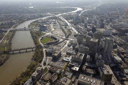 Aerial view of downtown WInnipeg, including Portage and Main, Shaw Park, Esplanade Riel, The Forks, The Canadian Museum for Human Rights, October 21st, 2011. (TREVOR HAGAN/WINNIPEG FREE PRESS) CMHR