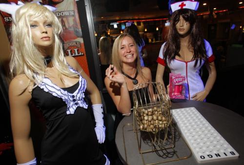 Carman Penner is the regular bingo caller for the Headingley Motor Inn and Beverage Room. Here she poses with some props in the bar.  Oct. 26, 2011 (BORIS MINKEVICH / WINNIPEG FREE PRESS)