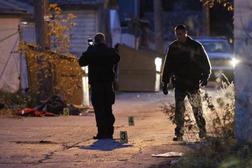 October 29, 2011 - 111029  -  Police investigate a shooting scene in a backlane between the 300 block of Pritchard and Selkirk at Salter Saturday October 29, 2011.    John Woods / Winnipeg Free Press