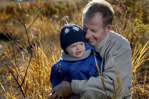 Vic Peters, curler and golfer spends some cuddle time with his grandson Jacob while finishing up work at Meadows Golf Course Wednesday. Peters   has remained very positive as he battles cancer.  See Ashley Prest story. Nov 2,2011 (Ruth Bonneville /  Winnipeg Free Press)