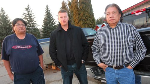 Brandon Sun Dakoka Plains' Craig Blacksmith, left, joins Rob Dickson of the Kahnawake Mohawk Nation and Canupwakpa Chief Frank Brown, right, for a photo on Wednesday afternoon in Brandon. FOR MATT (Bruce Bumstead/Brandon Sun)