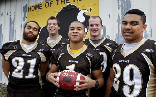 Sports/ Home Front.   Five Bisons football players named Canada West All-Stars (from left to right) Teague Sherman, Pete Adams, Anthony Coombs with ball, Thomas Hall and at right is Nic Demski. Ashley Prest story.  (WAYNE GLOWACKI/WINNIPEG FREE PRESS) Winnipeg Free Press Nov. 9  2011