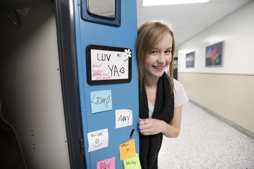 Grade 7 WIndsor School student Sydney shows off her stickers on the inside of her locker made by her classmates. This is the first year that the students are given the independance of their own lockers, moving to different rooms between classes and taking the transit bus on their own to name a few.  See 2017 project, Carolin Vesley and Doug Speirs Nov 10,2011 (Ruth Bonneville /  Winnipeg Free Press)