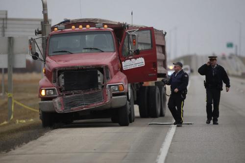 November 12, 2011 - 111112  -  RCMP investigate a collision in which a truck hit a pedestrian on the Perimeter Highway between Wilkes and Roblin Boulevard Saturday, November 12, 2011.    John Woods / Winnipeg Free Press