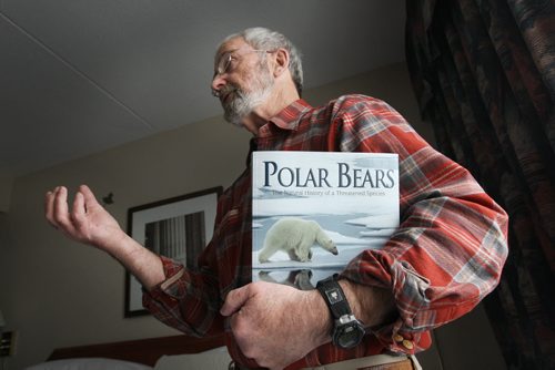 Dr. Ian Stirling with his book Polar Bears- The Natural History of the Threatened Species See Bartley Kives story Story  November 16, 2011   (JOE BRYKSA / WINNIPEG FREE PRESS)