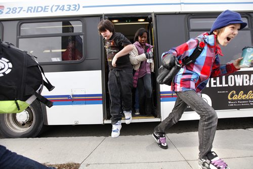 Grade 7 Windsor School students Garrett (right) and Julian (middle) raise off the transit bus heading back to school after shop class Tuesday. This is the first year that the students are given the independance of their own lockers, moving to different rooms between classes and taking the transit bus on their own to name a few.  See 2017 project, Carolin Vesley and Doug Speirs Nov 10,2011 (Ruth Bonneville /  Winnipeg Free Press)