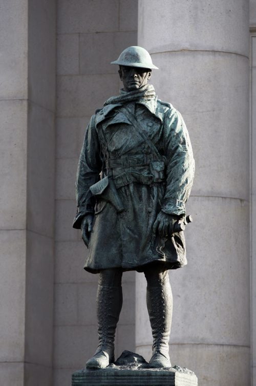 Remembering the Sacrifice - for STDUP / gallery / slide show  tribute - Some of the many Winnipeg memorials to Canada's Wars -  Remembrance Day Tribute - in  pic  , The   WW1 memorial is located  outside the Bank of Montreal at Portage and Main  - KEN GIGLIOTTI /  WINNIPEG FREE PRESS /  Nov. 24 2011 - Wpg War Memorials kgwarmemorial finds all for slide show -  The memorial was unveiled Dec 5 1923 , it portrays  in bronze  a WW1 soldier and commemorates the 231 Bank Of Montreal  employees from across Canada that died in WW1. The scuptor was James Earle Farmer and the  bronze was modelled after Captain Wynn Bagnall  a BMO staff member and  member of the  58th Field Artillery.The uniform is in error because the American sculptor did not have an example of a Canadian uniform to model the bronze after so an American uniform with boot style  and a slightly different cut. The design was a highly acclaimed  design  in its time. 
