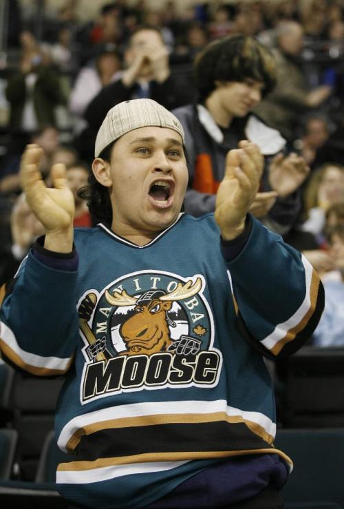 John Woods / Winnipeg Free Press / Dec 31, 2006 - 0611231  - Manitoba Moose fan Guillermo Ardon cheers on the team against the Syracuse Crunch Sunday Dec 31/06.     ***For fan feature***