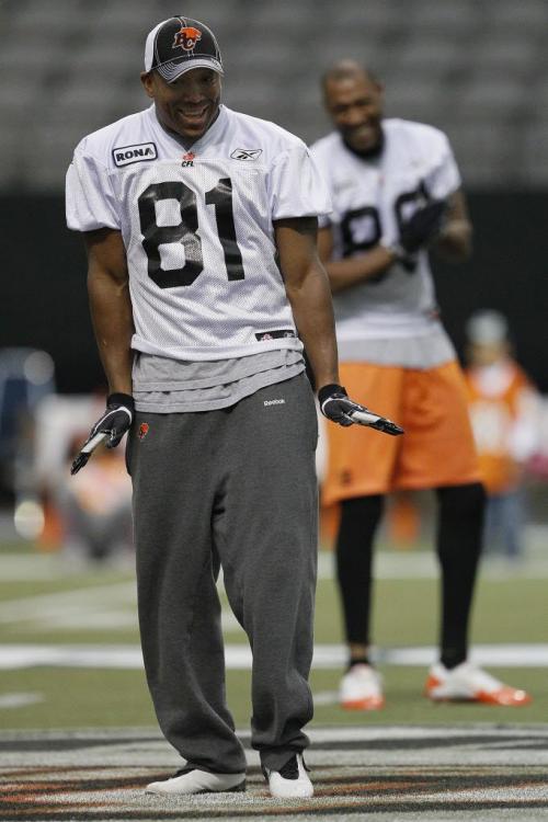 VANCOUVER, BC: NOVEMBER 26, 2011 --  BC Lions' Akeem Foster (88)(B/G) laughs as Geroy Simon (81) dances in the middle of the team during practice in Vancouver Saturday, November 26, 2011 ahead of the 2011 Grey Cup. (John Woods/Winnipeg Free Press)