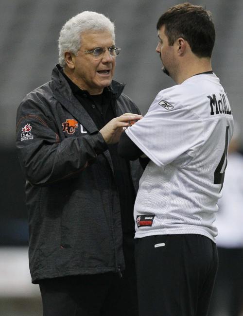 VANCOUVER, BC: NOVEMBER 26, 2011 -- BC Lions' head coach Wally Buono talks to Paul McCallum (4) during practice in Vancouver Saturday, November 26, 2011 ahead of the 2011 Grey Cup. (John Woods/Winnipeg Free Press)