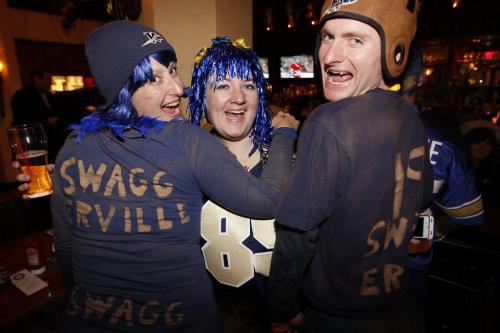 VANCOUVER, BC: NOVEMBER 27, 2011 --  Lisa Murphy-Quigley, Natalie Bargen and Adam Quigley (LtoR) were out taking part in Grey Cup festivities in Vancouver Saturday, November 26, 2011. (John Woods/Winnipeg Free Press)