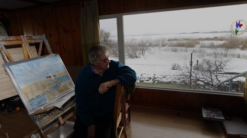 Delta Beach - Peter Ward  with Delta Marsh in the background  works on his  latest painting  - Delta Marsh artist  91 year old  Peter Ward  has been  put out of his  house  by Assiniboine River / Lake Manitoba flooding  continues to  go out to his  home and paint for a few hours each day .He lives in a rented house i Portage la Prairie  - Bill Redekop Story -  - KEN GIGLIOTTI /  WINNIPEG FREE PRESS /  Nov. 30  2011