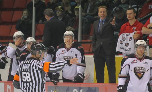 Brandon Sun Giants' assistant coach Glen Hanlon looks for an explanation on a penalty called by the official during Wednesday's WHL game at Westman Place. (Bruce Bumstead/Brandon Sun)