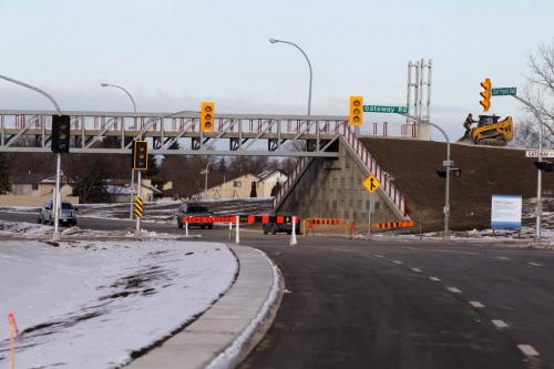 The extension of the Chief Peguis Bridge gets some final touches done to it by construction workers today. The road extends all the way to Lagimodiere Blvd. Gateway Road footbridge. December 1, 2011(BORIS MINKEVICH / WINNIPEG FREE PRESS)