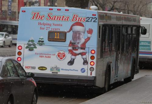 Santa Bus in front of the Bay. December 1, 2011(BORIS MINKEVICH / WINNIPEG FREE PRESS)