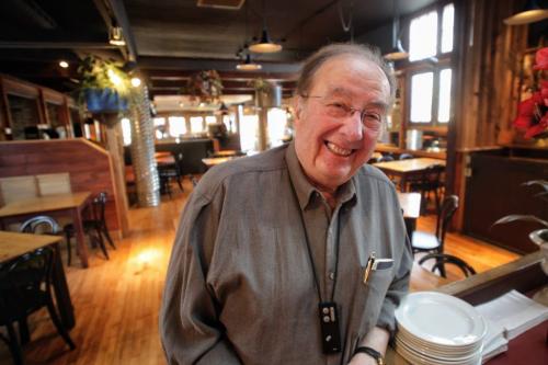 Basil Lagopoulos has reopened his restaurant Basil's in Osborne Village after a water-main flooded him out in 2008. 111206 Mike Deal / Winnipeg Free Press