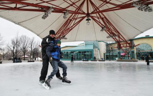 Ryan Day, 10, out for his first skate ever with friend Joe Maksymowicz at The Forks on Saturday afternoon.  111210 Mike Deal / Winnipeg Free Press