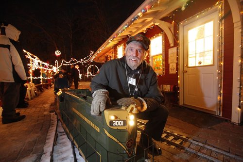 Bill Taylor - President of The Assiniboine Valley Railway started setting up lights in the late 90's and never dreamed it would become such a success.   "Christmas at the Taylors" which is a locally run mini-rail park that runs throughout the Christmas season at 3001 Roblin Blvd officially opened for the Christmas season Saturday night. See Geoff Kirbyson's story. Dec 10, 2011 (Ruth Bonneville /  Winnipeg Free Press)