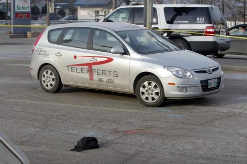 MVC at Portage Ave. and Maryland. Car vs man. A man died after being hit by an eastbound car.  December 11, 2011 BORIS MINKEVICH / WINNIPEG FREE PRESS