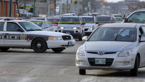 MVC at Portage Ave. and Maryland. Car vs man. A man died after being hit by an eastbound car.  December 11, 2011 BORIS MINKEVICH / WINNIPEG FREE PRESS