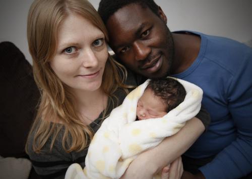 December 11, 2011 - 121211  -  Sara Heiinrichs and Anthony Chilufya are photographed with their son Jack Stephen in their home Sunday, December 11, 2011. Jack Stephen Chilufya was the first baby born in the new WRHA's new birthing centre. John Woods / Winnipeg Free Press